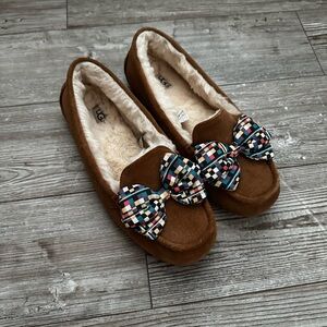 Ugg Moccasins-beautiful brand new with a coloured bow.